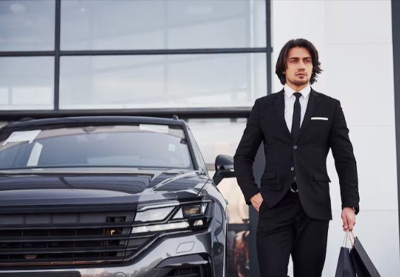 a business man with car for corporate work in ras khaimah
